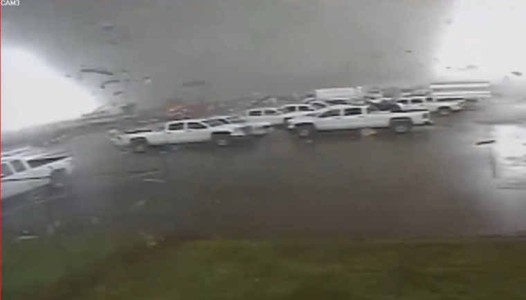 Security camera still of the 2020 Jonesboro EF3 tornado funnel at street level, March 28 2020